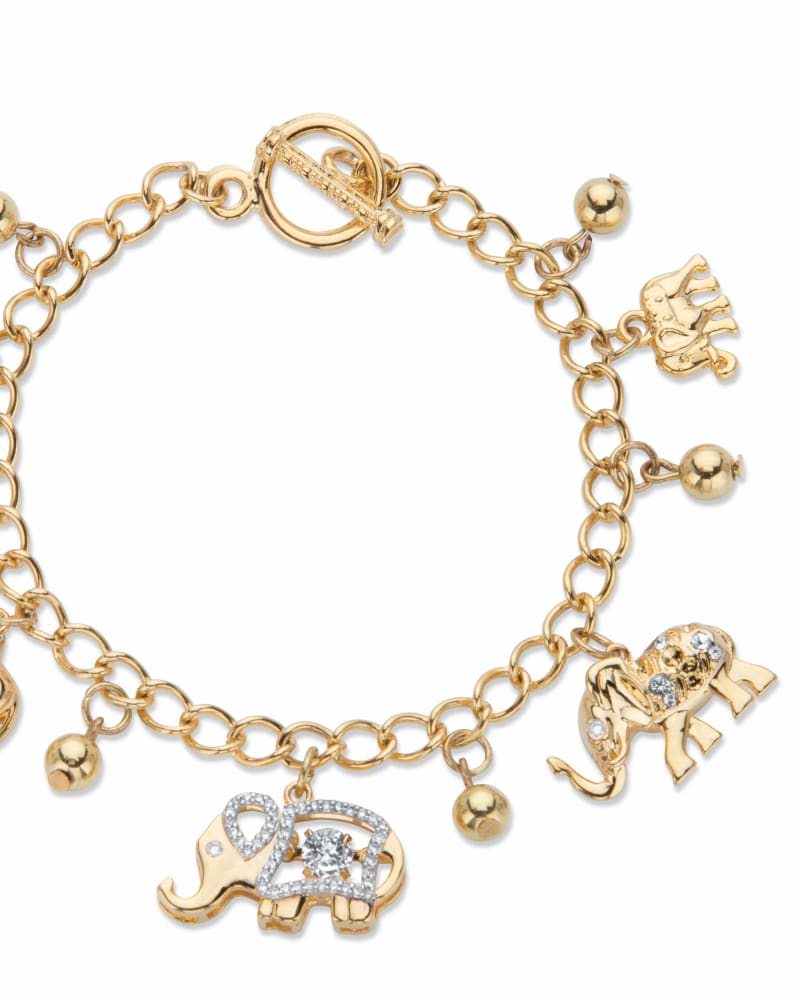 Front of a size 7.5 in Round Crystal Goldtone Elephant Charm Beaded Toggle Bracelet 7.5" in White by PalmBeach Jewelry. | dia_product_style_image_id:333089
